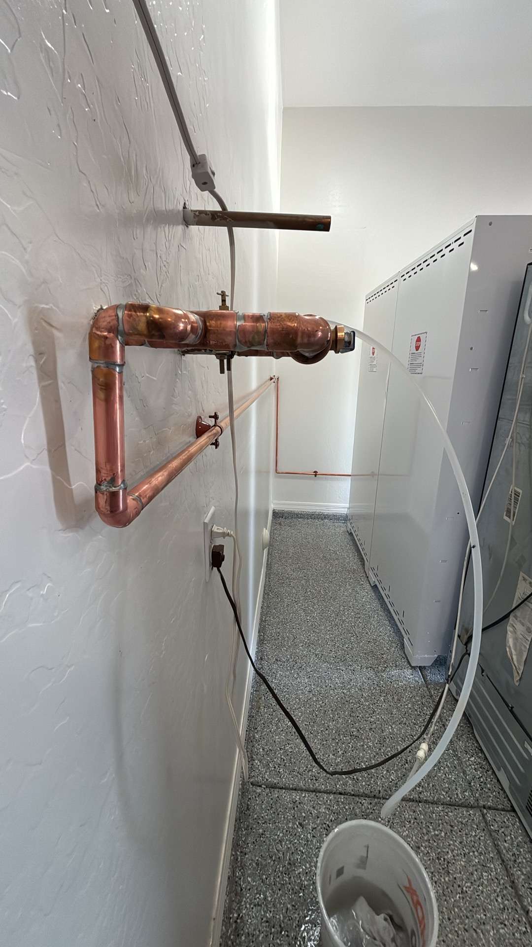 Copper pipe after a water leak repair service.