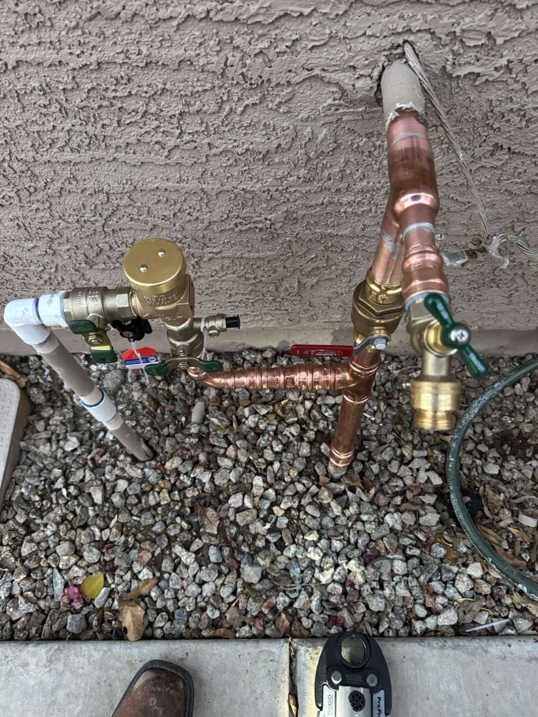 Exterior copper pipes after a water leak repair service
